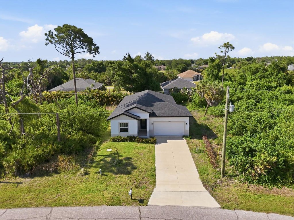 Photo of 136 Lomas Road, Rotonda West, FL 33947 (MLS # O6448588)