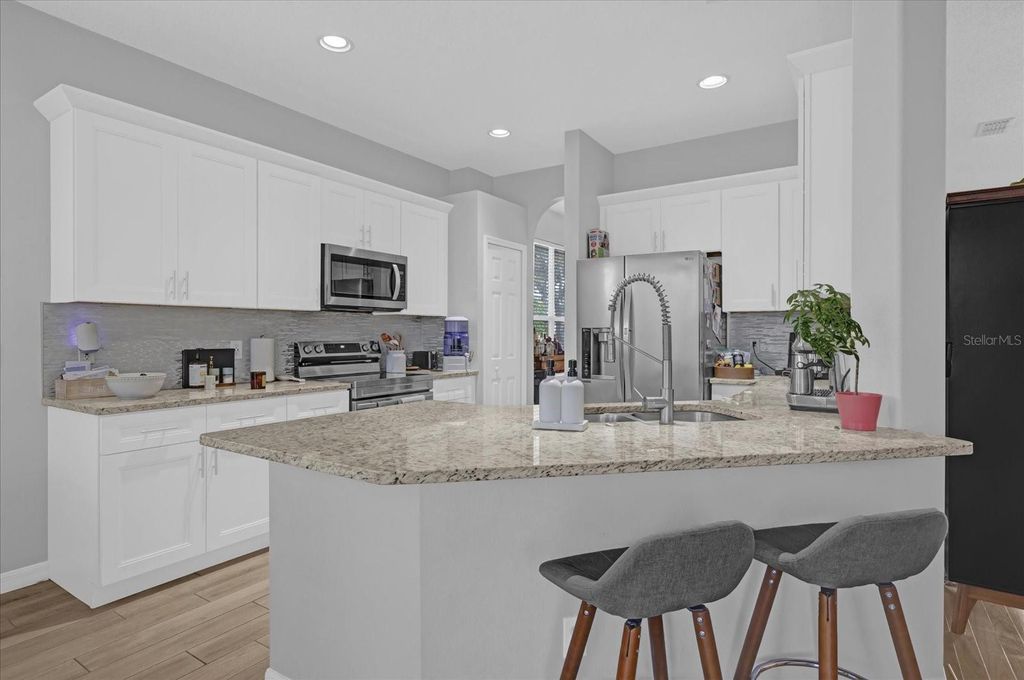 Photo of 1460 Misty Glen Lane, Clermont, FL 34711 (MLS # O6381282)