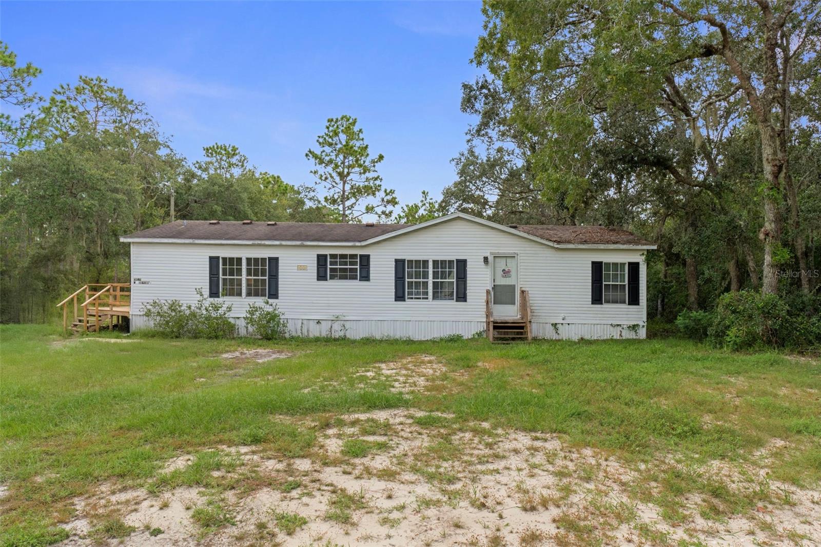 Tucked away on 2.44 acres in the peaceful Homosassa countryside, this 3-bedroom, 2-bath home offers the rare combination of space, privacy, and convenience to Florida’s Nature Coast. With 1,512 sq. ft. of living space, a spacious master suite with en suite bath and soaking tub, and updates that include all new flooring in 2025, a 2017 roof, 2022 A/C system, 2025 septic tank, 2021 well pump, and two new decks perfect for morning coffee or evening gatherings, the major items are already taken care of—leaving you free to imagine the possibilities. Whether you envision a thriving garden, room for pets to roam, or simply a quiet retreat surrounded by nature, this property delivers. A storage shed provides added utility, and with no HOA or CDD, you have the freedom to truly make it your own. Families will also appreciate being part of the well-regarded Citrus County School District, known for strong academics, career and technical programs, and extracurricular opportunities. Just minutes away, you’ll find Homosassa Springs Wildlife State Park, manatee encounters in Crystal River, Gulf Coast boating and fishing, and even Weeki Wachee Springs for a taste of “Old Florida.” This isn’t just a home—it’s an opportunity to create the lifestyle you’ve been searching for. The only question left is: what will you do with all this space? Schedule your showing today and see the possibilities for yourself!
