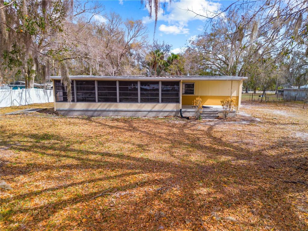 Photo of 275 N Myrtle Drive, Kenansville, FL 34739 (MLS # S5144588)