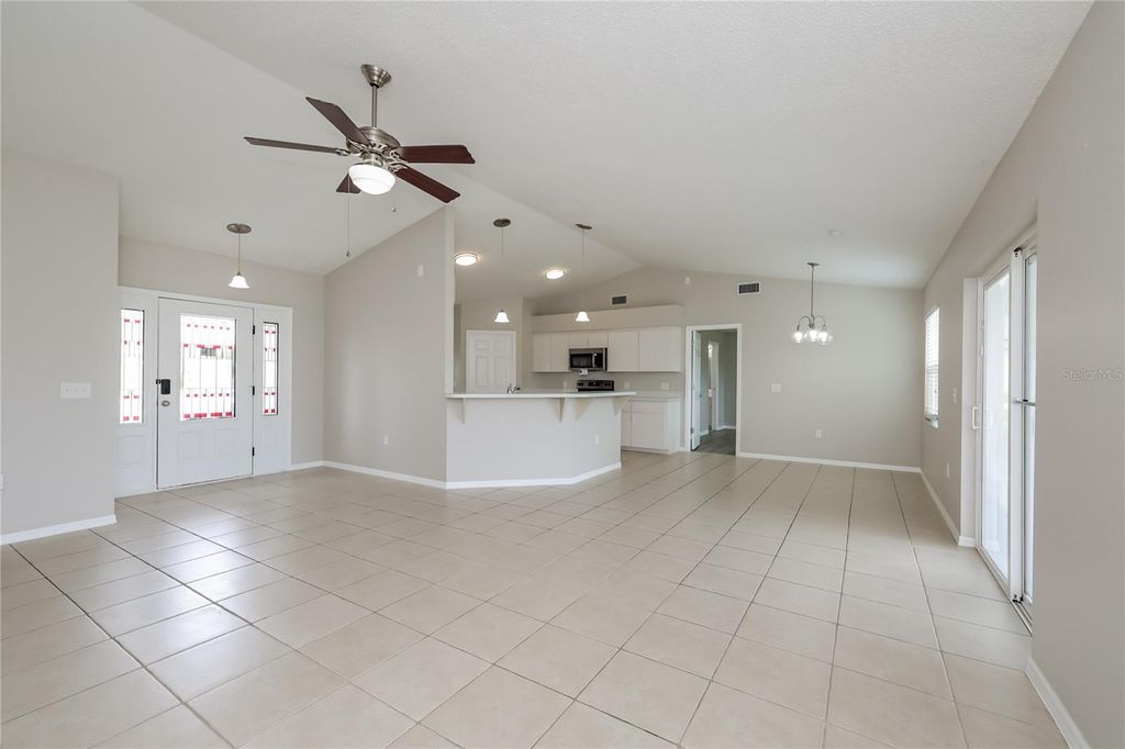 Photo of 102 Ashley Loop, Davenport, FL 33837 (MLS # O6365871)