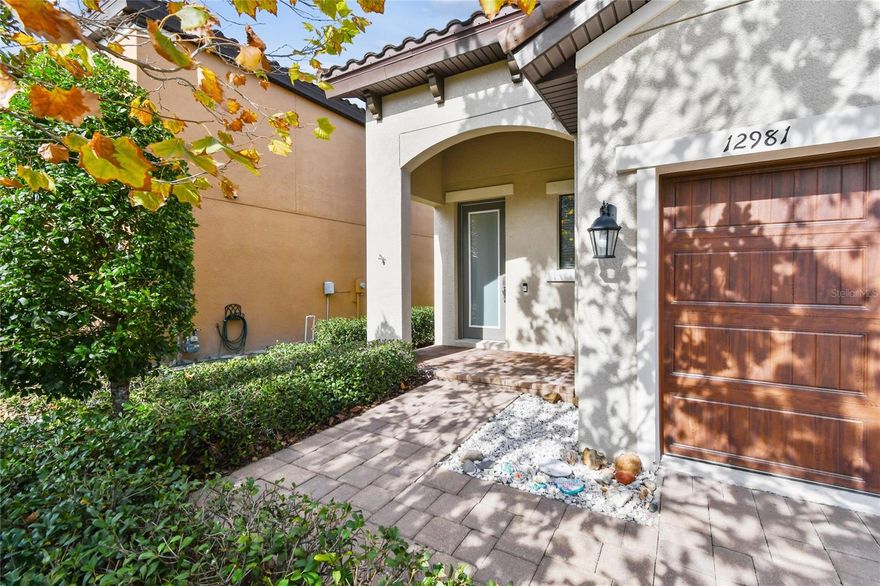 Welcome to Starkey Ranch living in a beautifully maintained, single-story home designed for comfort, connection, and ease. This 3-bedroom, 2-bath residence offers a bright, open layout with neutral finishes, tile flooring in the main living areas, and a well-appointed kitchen featuring white cabinetry, quartz countertops, stainless steel appliances, a gas cooktop, and a generous pantry.  The seamless flow from kitchen to dining and living spaces makes everyday living and entertaining effortless, while sliding glass doors open to a private, fenced backyard—ideal for relaxing or gathering outdoors. The primary suite provides a peaceful retreat with ample space and storage.  Situated on a corner lot within the award-winning Starkey Ranch community, residents enjoy an exceptional lifestyle with miles of scenic walking and biking trails, multiple community pools and splash pads, playgrounds, dog parks, and year-round events. A standout amenity is the Starkey Ranch Theatre, Library & Cultural Center, offering programs, performances, and resources for all ages.  Just minutes away, the vibrant Starkey Market adds energy and charm to everyday life with fresh produce, coffee, food trucks, live music, and seasonal gatherings that bring neighbors together. Zoned for the highly regarded Starkey Ranch K–8 School and conveniently located near shopping, dining, medical facilities, and major routes to Tampa, Clearwater, and the Gulf beaches, this home delivers the whole Starkey Ranch experience in a manageable, well-cared-for package.  A rare opportunity to enjoy single-story living and genuine community connection in one of Tampa Bay’s most sought-after neighborhoods.  A rare opportunity for buyers seeking single-story living, exceptional schools, and unmatched community amenities at an approachable entry point into Starkey Ranch.