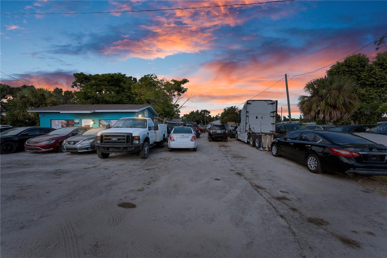 Prime investment opportunity on high-traffic 15th Street East! For over 20 years, this property has operated as a successful auto sales business with the added benefit of multiple income-producing rentals. Situated on nearly an acre of land, the property includes a 2BR/1BA unit, two 1BR/1BA units, one 3BR/1BA unit, plus an office building.
With plenty of paved parking, additional storage areas, and space ideal for RV or boat storage, this property provides additional revenue potential. The flat layout and partially fenced lot add both security and flexibility for future expansion.
Located on a heavily traveled corridor, this property offers outstanding exposure for any business. Whether you continue the existing auto sales operation or bring your own vision, this property is a rare opportunity to secure land, improvements, and income in a high-demand location.
Listing price reflects land and improvements only. Auto inventory negotiable. Motivated seller—don’t miss your chance!