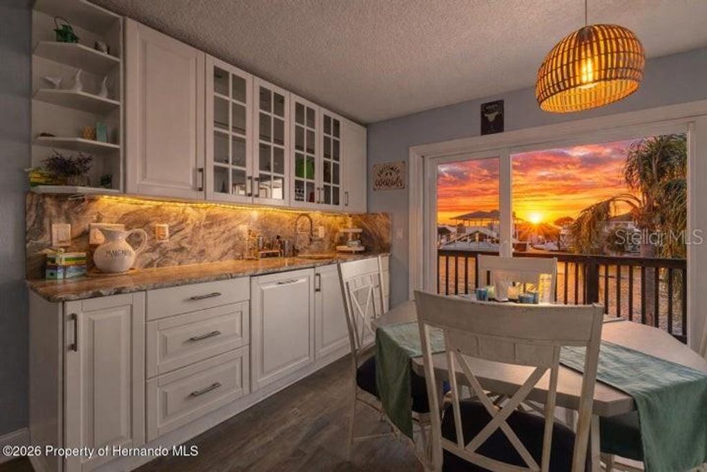 Photo of 3416 Crape Myrtle Drive, Hernando Beach, FL 34607 (MLS # W7882305)