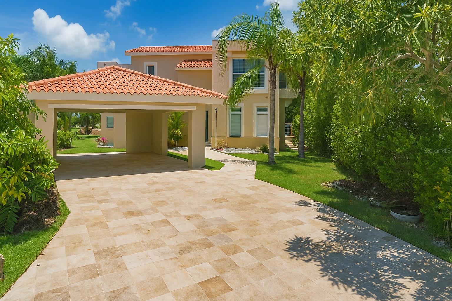 Welcome to Palmas Plantation, a family-friendly gated community within Palmas del Mar Resort, where this Turberry model home delivers both space and lifestyle in one of the most sought-after enclaves.
Set on a generous 758 square meter lot, this two-level home offers 2,400 square feet of indoor living space, complemented by approximately 1,000 square feet of outdoor terraces and covered garage areas that invite year-round enjoyment.
Located on a quiet cul-de-sac, the home opens to wide golf course views and a layout built for easy living. The expansive backyard features a private pool with slide, gazebo, and a sprawling covered terrace perfect for weekend gatherings or quiet evening dinners. Upstairs, the primary suite opens to a large private terrace, ideal for morning coffee or stargazing under Caribbean skies.
Additional features include a covered carport, power generator, and access to all the amenities that make Palmas del Mar a one-of-a-kind destination, including proximity to Palmas Academy, equestrian trails, tennis courts, golf, beaches, and dining.
Palmas del Mar HOA - $1,300 annually / Palmas Plantation HOA $200.00 monthly