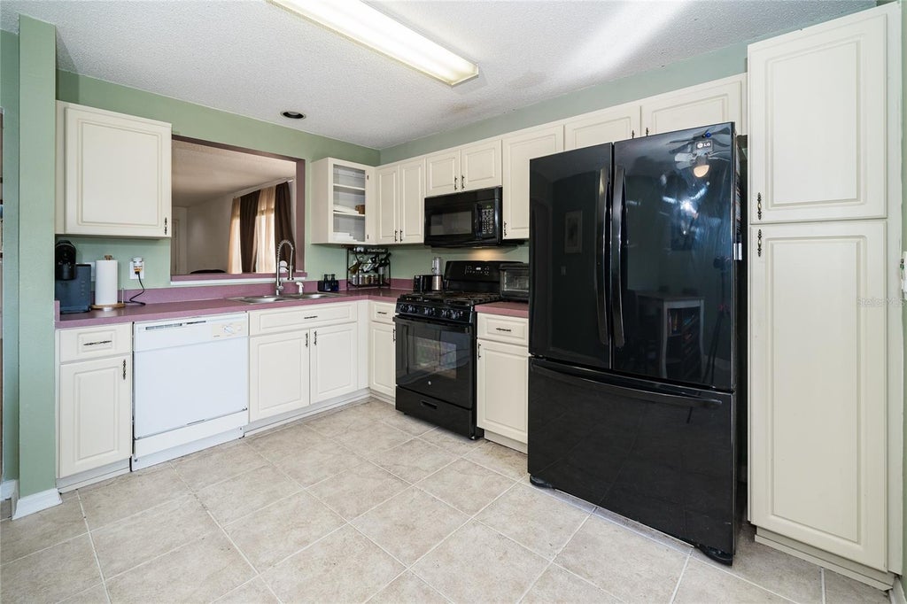 Photo of 5837 Sand Key Lane, Wesley Chapel, FL 33545 (MLS # TB8560376)
