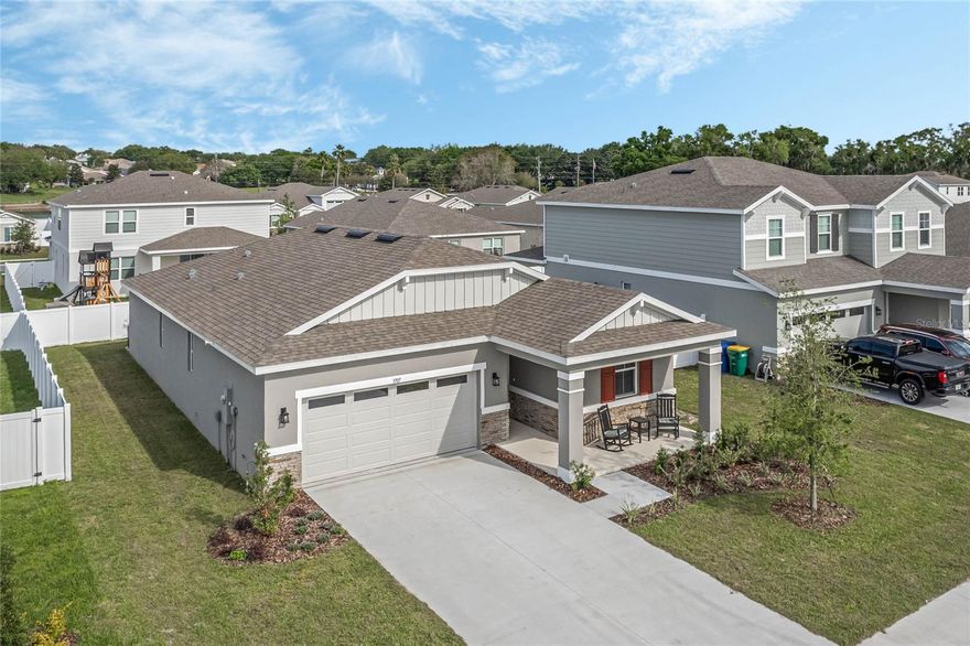 Built in 2023! Seller assistance with closing costs. FHA & VA welcome. Located just steps from downtown Tavares, you'll enjoy easy access to charming eateries, boutiques, and vibrant community events. As a resident, you will also have access to an onsite pier on Lake Harris and scenic community trails. An exceptional opportunity in the heart of Tavares, the Seaplane Capital of the World. This newly constructed home is ready for immediate occupancy, free from builder's fees, and awaits your personal touch. Presenting the Azure model home, completed in 2023 and enhanced with over $38,000 in upgrades. This residence boasts luxurious LVP flooring and is situated on a premium lot in the esteemed Seasons at Lakeside Forest community. The backyard offers a serene retreat with lush greenery and a covered patio surrounded by a privacy fence, perfect for enjoying the peaceful surroundings. Inside, high-speed wiring throughout ensures seamless connectivity. The expansive open floor plan is ideal for both everyday living and grand celebrations. The generously sized laundry room simplifies daily chores, while the luxurious en suite master bathroom features a spacious walk-in closet. This extraordinary home offers the perfect blend of modern amenities and enchanting surroundings. Seize this opportunity to make it your own and experience the unique charm of Tavares.