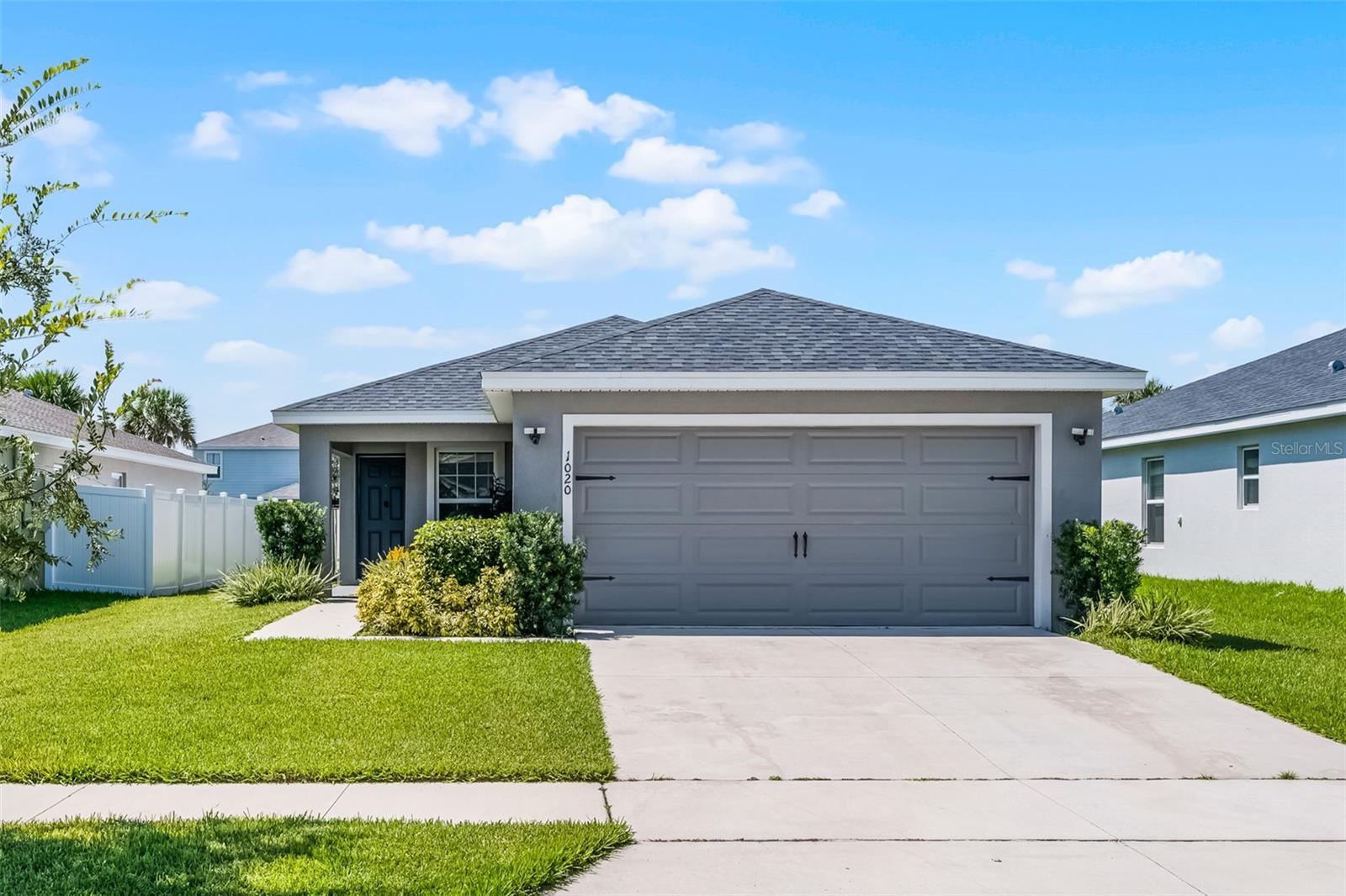 Welcome to 1020 Silas Street, located in Gracelyn Grove, a charming community in Haines City, Florida. This 3-bedroom, 2-bathroom home offers the perfect blend of comfort, convenience, and style, all nestled in a serene suburban neighborhood with low HOA fees and no CDD.
Step inside to discover a bright and open floorplan with vaulted ceilings that enhance the spacious feel throughout. The split-bedroom layout offers privacy and functionality, with the primary suite located at the back of the home, featuring a double vanity, stand-alone shower, and generous space to relax. The two guest bedrooms are positioned at the front of the home with a full guest bath featuring a tub/shower combo. Additional highlights include an inside laundry room and a single rear door leading to a covered lanai and backyard—perfect for outdoor enjoyment.
Gracelyn Grove offers residents a peaceful lifestyle with convenient access to major attractions. Ideally situated off US-27 with quick access to I-4, you’re just minutes from Central Florida’s top destinations including Legoland and Bok Tower Gardens. Everyday conveniences are nearby, with Publix only 8 minutes away and a variety of dining and shopping options at Posner Park, just a short 20-minute drive.
Don't miss your opportunity to live in one of Haines City’s most desirable communities—1020 Silas Street is ready to welcome you home!