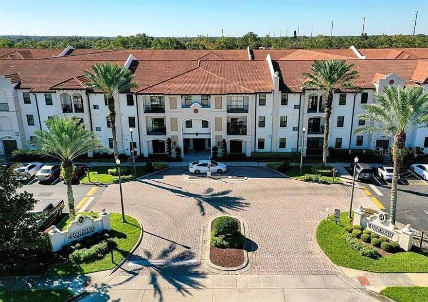 Discover resort-style living at its finest in this Spanish-inspired, fully gated condo community. This beautifully designed 2-bed, 2-bath unit features granite countertops throughout, a fully upgraded kitchen with state-of-the-art stainless-steel appliances, and enclosed air-conditioned hallways for added comfort. Residents enjoy exceptional amenities, including two stunning pool areas with a hot spa, a peaceful courtyard perfect for relaxing, yoga, or reading, complimentary Wi-Fi in shared spaces, a fully equipped fitness center, a professional business center with an executive conference room, and a stylish clubhouse with a billiards lounge. Ideally located between Downtown Orlando and the Orlando International Airport, you’ll be just minutes from major retailers such as Aldi, Five Below, Ross, Walmart, and only 13 miles from the vibrant shops and restaurants of Lake Nona.