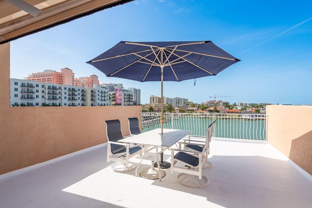 Photo of 120 Brightwater Drive #1, Clearwater Beach, FL 33767 (MLS # TB8396249)