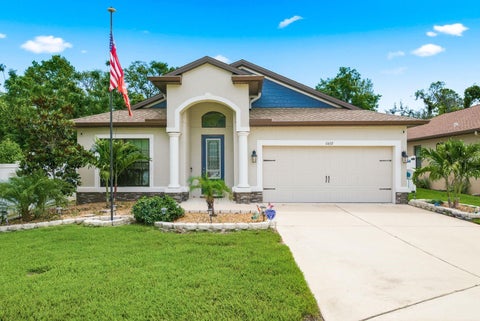 Photo of 11632 Weaver Hollow Road, New Port Richey, FL 34654 (MLS # TB8512774)