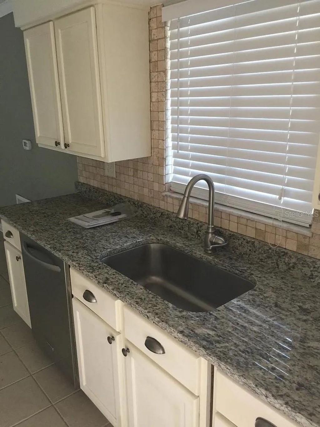 Photo of 3115 Winchester Drive, Dunedin, FL 34698 (MLS # TB8381332)