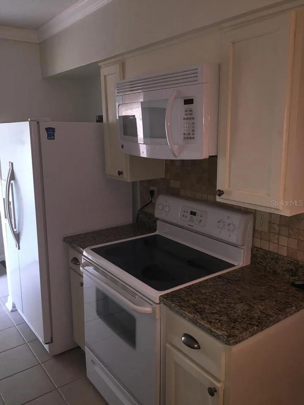 Photo of 3115 Winchester Drive, Dunedin, FL 34698 (MLS # TB8381332)