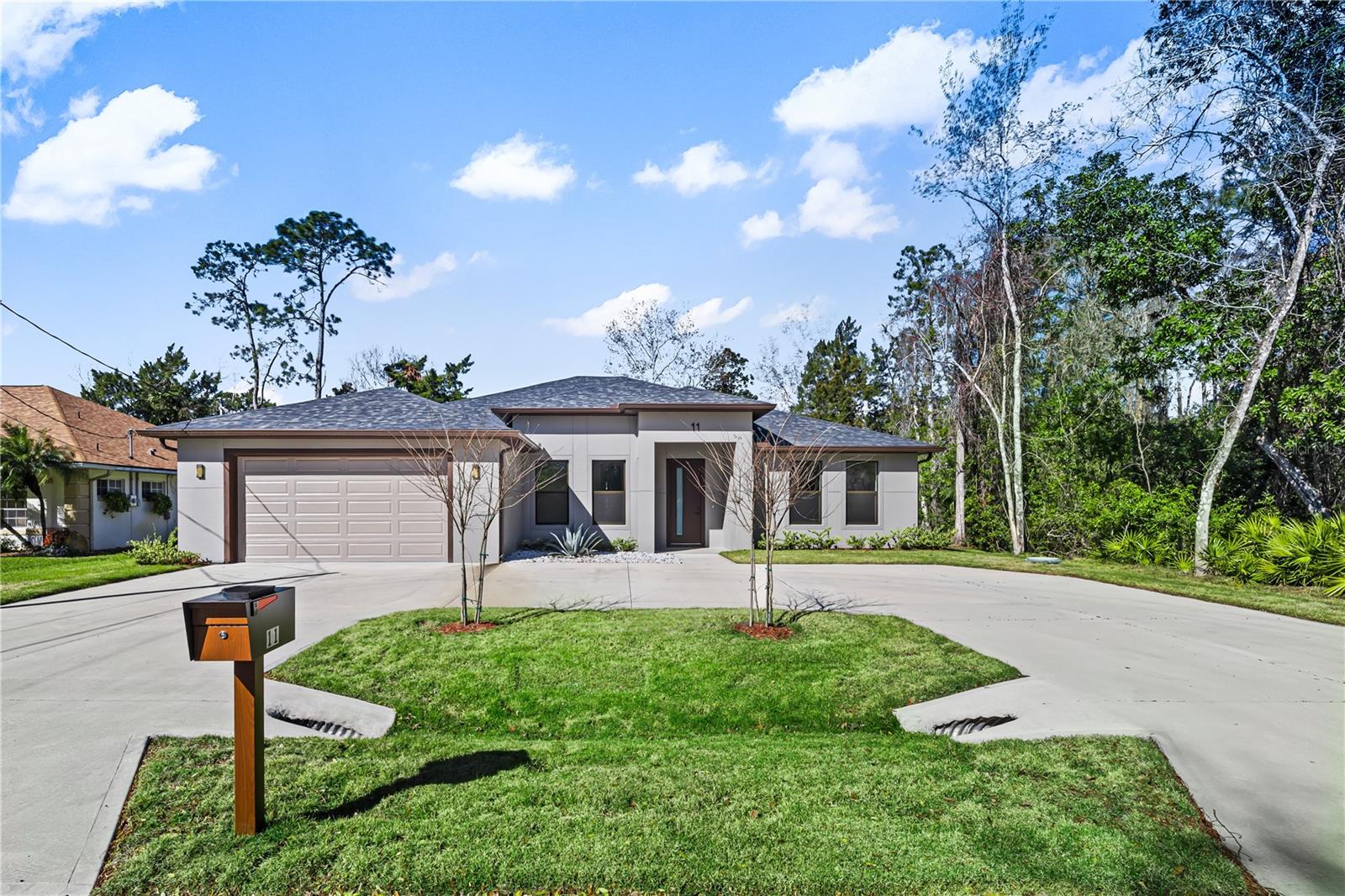 New Construction Custom House for Rent !!! Welcome to your dream home at 11 Ethan Allen Drive, where modern elegance meets practical design. This custom-built house offers a seamless blend of contemporary style and functional living spaces, perfect for a family seeking comfort and sophistication. Features: -2 Master Bedrooms is a private retreat, featuring spacious layouts, walk-in closets, and stylish en-suite bathrooms with walk-in shower and a sleek glass enclosure -2 additional Bedrooms offers comfort and versatility for family or guests -Third Bathroom in addition to the en-suite master bathrooms, there is a convenient guest bathroom designed with modern fixtures and finishes -2 Car Garage: The garage is equipped with a smart app-controlled door opener and an epoxy-coated floor, offering both convenience and durability. Total Under Roof: 3,547 sq ft** - **Living Area: 2,548 sq ft** - **Garage: 537 sq ft** - **Front Entry: 61 sq ft** - **Lanai: 401 sq ft** -Open Concept Living: The floor plan features soaring vaulted ceilings, modern trim and baseboards, and elegant light fixtures. The living, dining, and kitchen areas flow seamlessly together, creating an ideal space for both relaxation and entertaining. -Kitchen: At the heart of the home is a beautiful kitchen complete with a large customized quartz island and high-end stainless steel appliances. Additional Features: 8’ doors throughout the home. 9’-4” ceilings in all bedrooms and living area Smart energy-efficient AC units and double-pane windows and sliding doors. Bathrooms feature floating vanities with beautiful bronze Delta fixtures. Remote-controlled ceiling fans and all LED light fixtures, including well-positioned recessed lights. Covered patio with a summer kitchen for outdoor enjoyment. This home is located in Palm Coast, a highly sought-after area known for its convenient access to St. Augustine and Daytona Beach. You’ll be close to shopping centers, Town Center, restaurants, parks, and healthcare facilities. With easy access to US-1 and I-95, and just a 15-minute drive to Flagler Beach, you’ll enjoy the best of Florida living. The area is ideal for outdoor enthusiasts, offering year-round activities like canoeing, kayaking, boating, bicycling, and golf. Don’t miss the opportunity to make this exquisite home yours. Contact me today for more information and to schedule a private tour.
