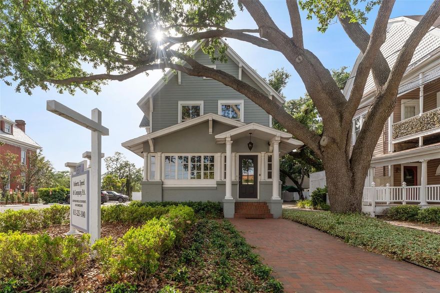 Under contract-accepting backup offers. Welcome to an exceptional opportunity in the heart of South Tampa! Originally built in 1900, this iconic Hyde Park property has been completely renovated to meet modern standards while preserving its timeless character and charm. Perfectly positioned one block to Bayshore Blvd, a half mile to vibrant Downtown Tampa, and 1 mile to Hyde Park Village, this location offers unmatched convenience and prestige.
The RO-1 zoning allows the property to have flexible residential/office uses. Currently utilized as a professional office space, the property features a flexible layout that could be used as a combined live-work arrangement, high end coworking space, or with reconfiguration transformed into a stunning single-family residence.  If you're a CEO looking to relocate your firm or headquarters, this is a rare chance to secure a one-of-a-kind property that reflects the prestige and success of your business.
 With high ceilings, beautiful hardwood floors, and expansive windows that flood the interior with natural light, every detail has been thoughtfully updated to blend historic elegance with modern functionality.
The building offers ample parking, lush landscaping, and an inviting front porch that adds to its classic curb appeal. Whether you're seeking a distinctive office environment, a luxurious home, or a live-work opportunity, this one-of-a-kind property provides endless potential in one of Tampa’s most sought-after neighborhoods.
High and dry with NO Flood Insurance required! Don’t miss the chance to own a piece of history, steps away from top dining, shopping, parks, and all the excitement South Tampa has to offer!