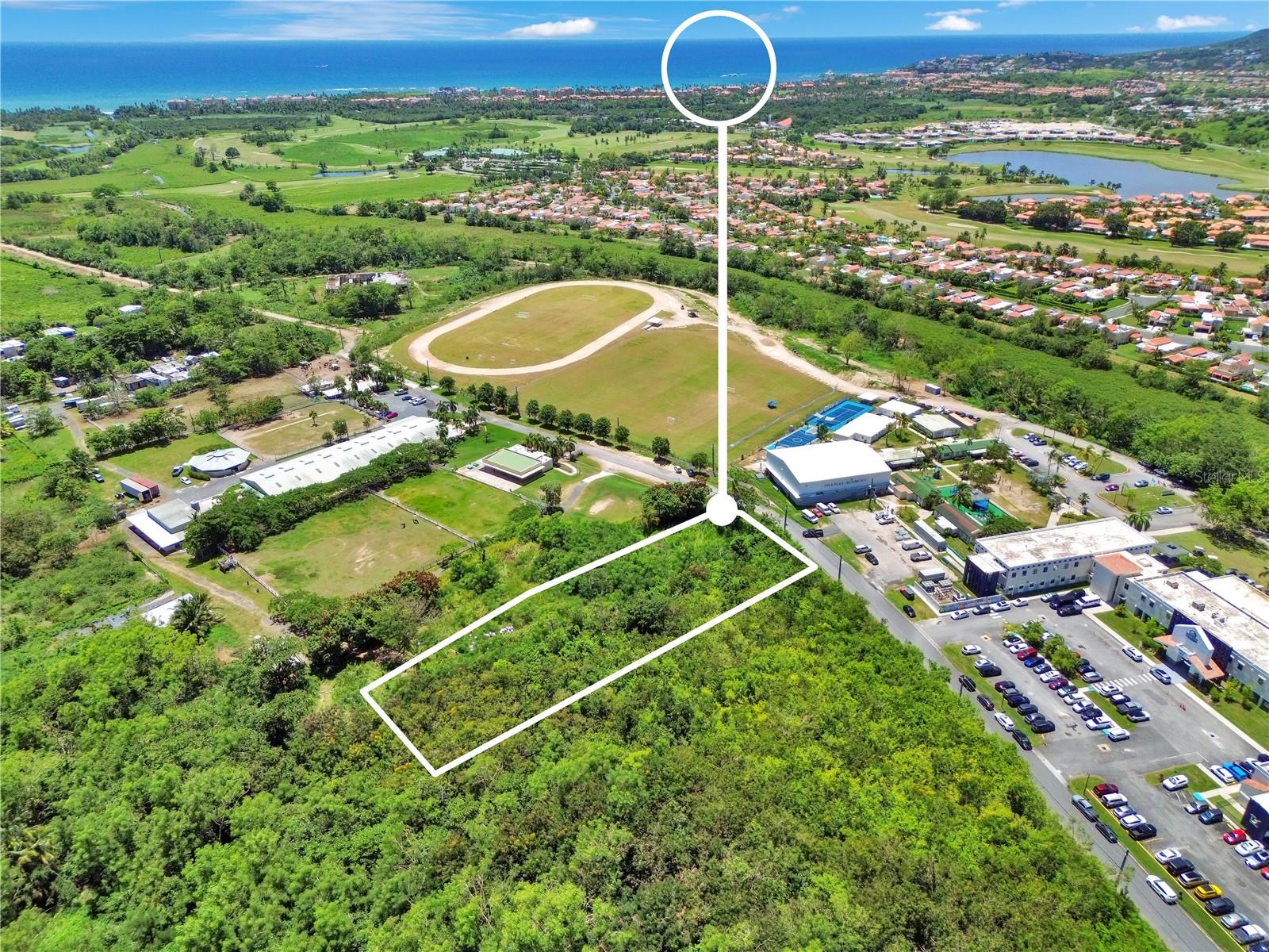 Prime 3,943.39 m² lot located within the exclusive Palmas Del Mar Resort, Humacao, PR. Positioned in Flood Code X and under PDM zoning, this mostly level property is situated across from the Palmas Academy and adjacent to the equestrian center. Just 329.68 meters from Palmas Del Mar’s second entrance, this lot is easily accessible yet offers tranquility within the resort. With specific uses subject to approval by the Palmas Del Mar Architectural Review Board (ARB) under the PP4 designation of the resort’s master plan, this lot provides a unique opportunity to design a space aligned with Palmas Del Mar’s high standards. Coordinates (18.1056278, -65.80725447)