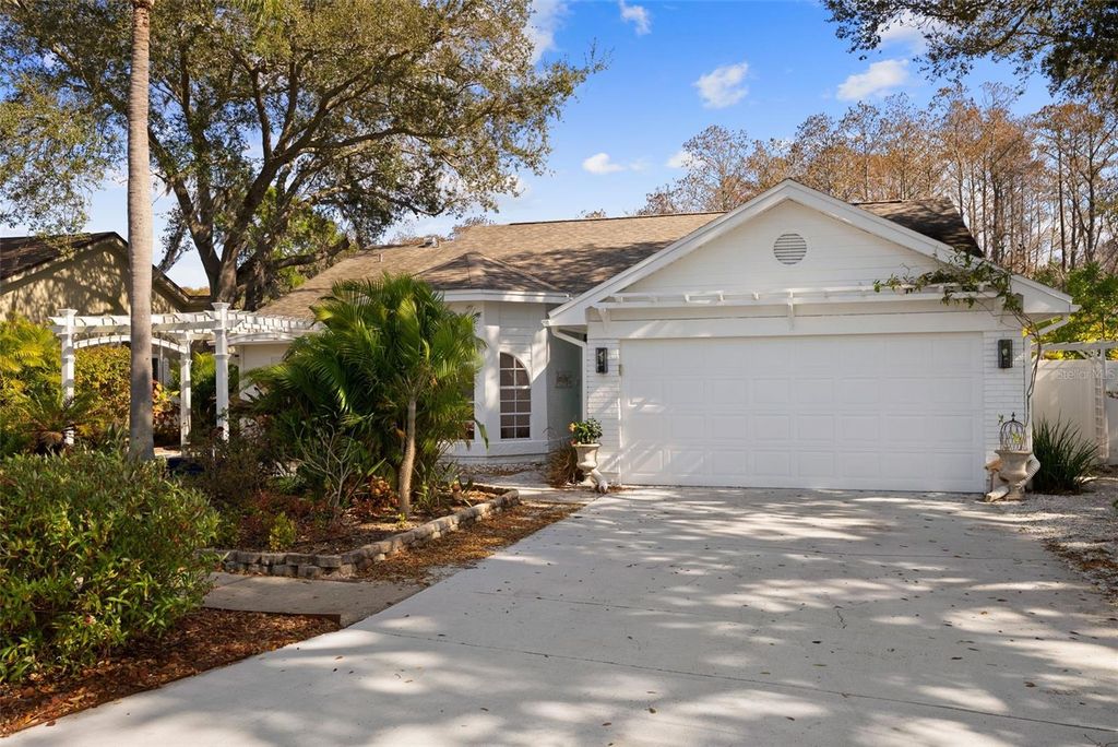 Photo of 1675 Polo Club Drive, Tarpon Springs, FL 34689 (MLS # TB8469951)