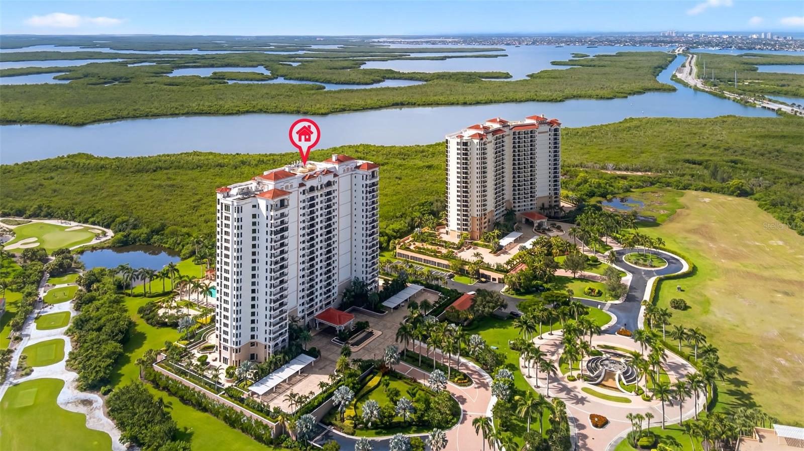 Experience Elevated Coastal Luxury in this beautiful 2BR + den, 2.5Bath turnkey-furnished residence, perfectly perched on the 7th floor with breathtaking panoramic views of McIlvane Bay and the Marco Island Skyline. Your private elevator opens directly into a grand foyer, setting the stage for the refined elegance within. The open concept design showcases full-height IMPACT SLIDING DOORS, an expansive screened lanai, an open kitchen featuring new KitchenAid appliances, REMOVED UPPER CABINETS for unobstructed views. Other UPDATES include Hunter Douglas MOTORIZED BLIND and AUTOMATIC ROLLDOWN SHUTTERS, and fresh interior paint create a seamless, move-in-ready space. The DEN functions beautifully as a guest room or private office, with French doors and a one-way window that frames the amazing views while preserving your privacy. Both bedrooms are impressively spacious. The primary suite offers a SPACIOUS WALK IN CLOSET and a luxurious bathroom with dual vanities, a soaking tub, and separate shower. The guest suite is generous enough to fit two queen beds, and also features its own walk-in closet and ensuite bath—perfect for hosting in comfort and style. Two deeded parking spaces—one just steps from the lobby—add everyday convenience. The Aversana lifestyle offers a resort-style pool & spa, sauna, state-of-the-art fitness center, billiards room, theater, grilling area, and on-site guest suites. Monthly community events enhance the social charm, all within a gated, non-mandatory golf community just minutes from Marco Island Beaches. Marco Island Executive airport is only 1.5 miles away. Whether as your full-time residence or seasonal escape, this sky-high sanctuary delivers the ultimate in coastal luxury lifestyle. Schedule your private tour today!