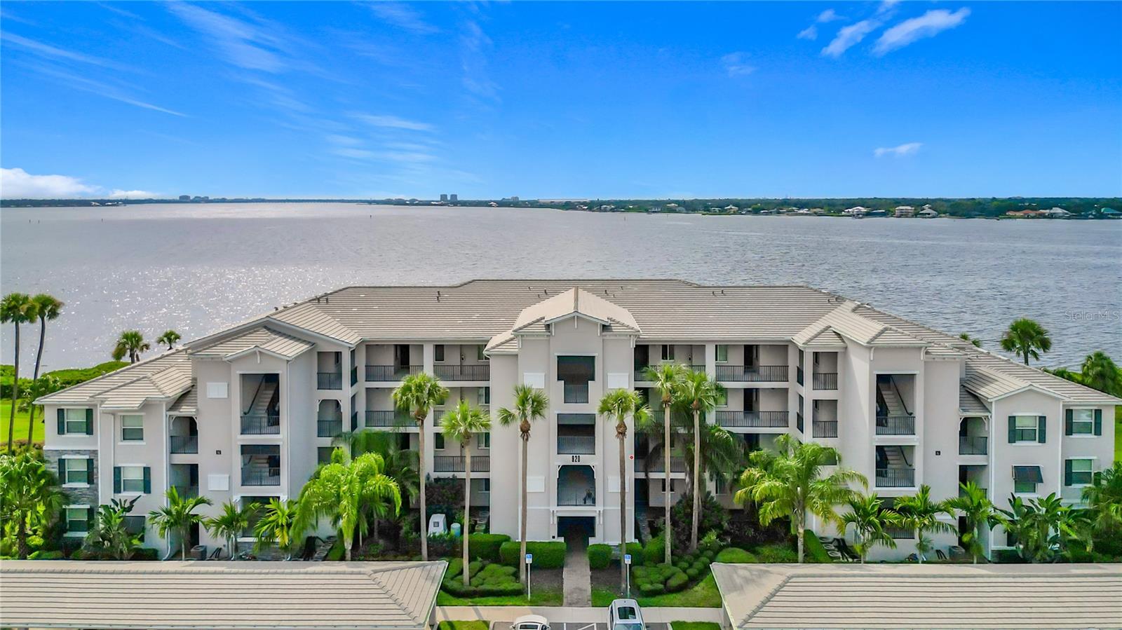 Experience stunning Manatee River views and resort-style living in this move-in-ready condo, perfectly situated in the highly desirable Tidewater Preserve community. This property is eligible for traditional financing. Built in 2019, this 2-bedroom, 2-bath home offers a bright and open layout, a spacious primary suite with dual walk-in closets, and a private screened lanai where you can unwind while watching boats, dolphins, and unforgettable Florida sunsets.
The chef’s kitchen is equipped with stone countertops, stainless steel appliances, and a generous island—ideal for entertaining. Tile flooring, tray ceilings, and an in-unit laundry area add to the comfort and convenience, along with an assigned covered parking space just steps from the building.
For boat lovers, this is truly a paradise. Tidewater Preserve features its own private marina with boat slips available to rent and direct lift access to the Manatee River and out to the Gulf. The gated community offers top-tier amenities including three pools (one overlooking the river), two fitness centers, tennis courts, a kayak/canoe launch, dog park, scenic walking trails, and two beautifully appointed clubhouses with kitchens, lounges, and more.
The HOA includes high-speed ULTRAFi internet and maintenance-free living, plus a full-time lifestyle director who coordinates neighborhood events and exercise classes. With easy access to I-75, Sarasota, UTC Mall, and both Tampa and SRQ airports, this location combines coastal charm with modern convenience—without the traffic of island living.
Schedule your private showing today—your waterfront lifestyle begins here!