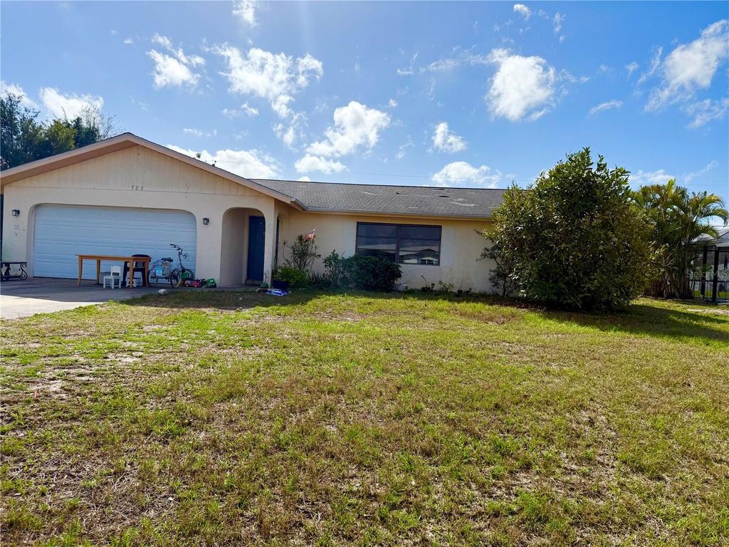 Photo of 783 Spring Lake Boulevard NW, Port Charlotte, FL 33952 (MLS # C7522867)