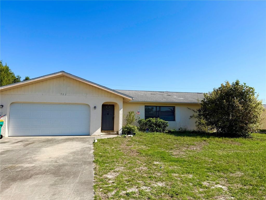 Photo of 783 Spring Lake Boulevard NW, Port Charlotte, FL 33952 (MLS # C7522867)