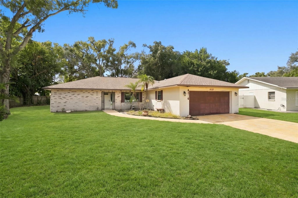 Photo of 8326 Sylvan Woods Drive, Sarasota, FL 34243 (MLS # TB8558685)