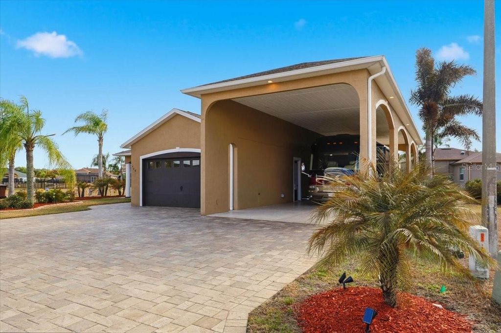 Photo of 708 Teaberry Trail, Polk City, FL 33868 (MLS # L4959057)