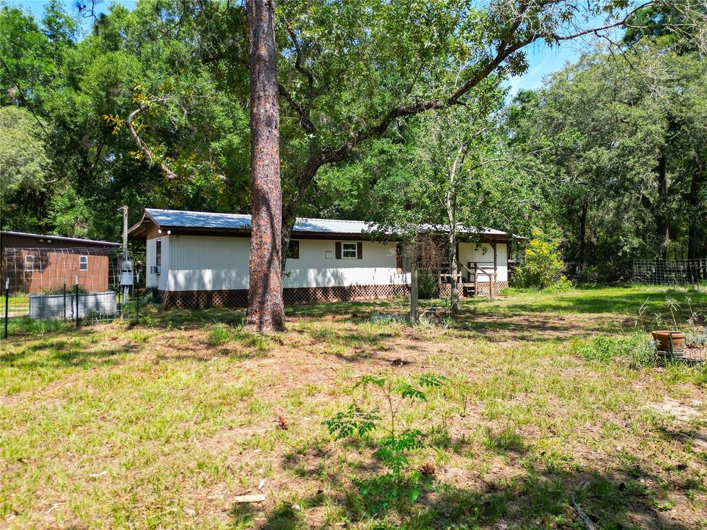 Photo of 8115 Shaw Road, Brooksville, FL 34602 (MLS # W7875831)