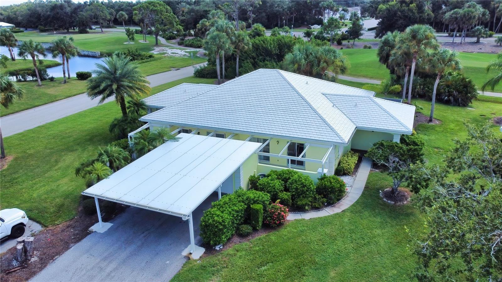 Step into this beautifully maintained, rarely available three-bedroom two-bathroom villa located in the Plantation Golf and Country Club. This gem is being offered turnkey furnished. This home boasts an open floor plan, creating a seamless flow between living spaces, perfect for entertaining and everyday living.The updated kitchen features modern appliances and elegant finishes, making it a chef's delight. The primary suite includes a double vanity and a generous walk-in closet for ultimate convenience. Enjoy stunning golf course views from your patio, enhancing your outdoor experience. Recent upgrades include a new roof installed in 2023 and a hot water heater replaced in 2021, new flooring, and fresh paint ensuring peace of mind for the new homeowner.Don’t miss this opportunity to own a slice of paradise in Augusta Villas! While membership to Plantation Golf and Country Club is not mandatory, it offers two championship 18-hole golf courses, tennis and pickleball courts, and dining and social activities.Situated close to Wellen Park, pristine beaches, shopping, and a variety of recreational activities, this villa offers the perfect blend of luxury and lifestyle. Perfect for a full time home, winter retreat or an investment opportunity! Rental history available upon request.