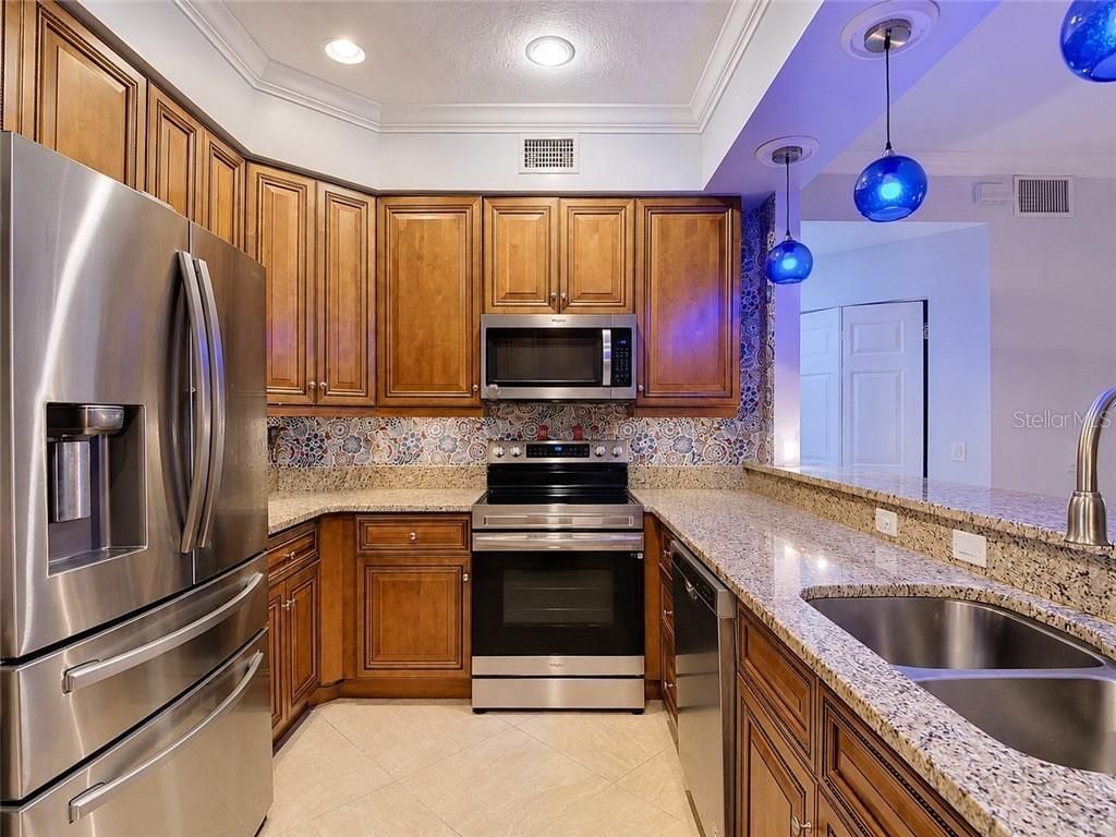 Photo of 1051 Winding Pines Circle #105, Cape Coral, FL 33909 (MLS # G5113207)