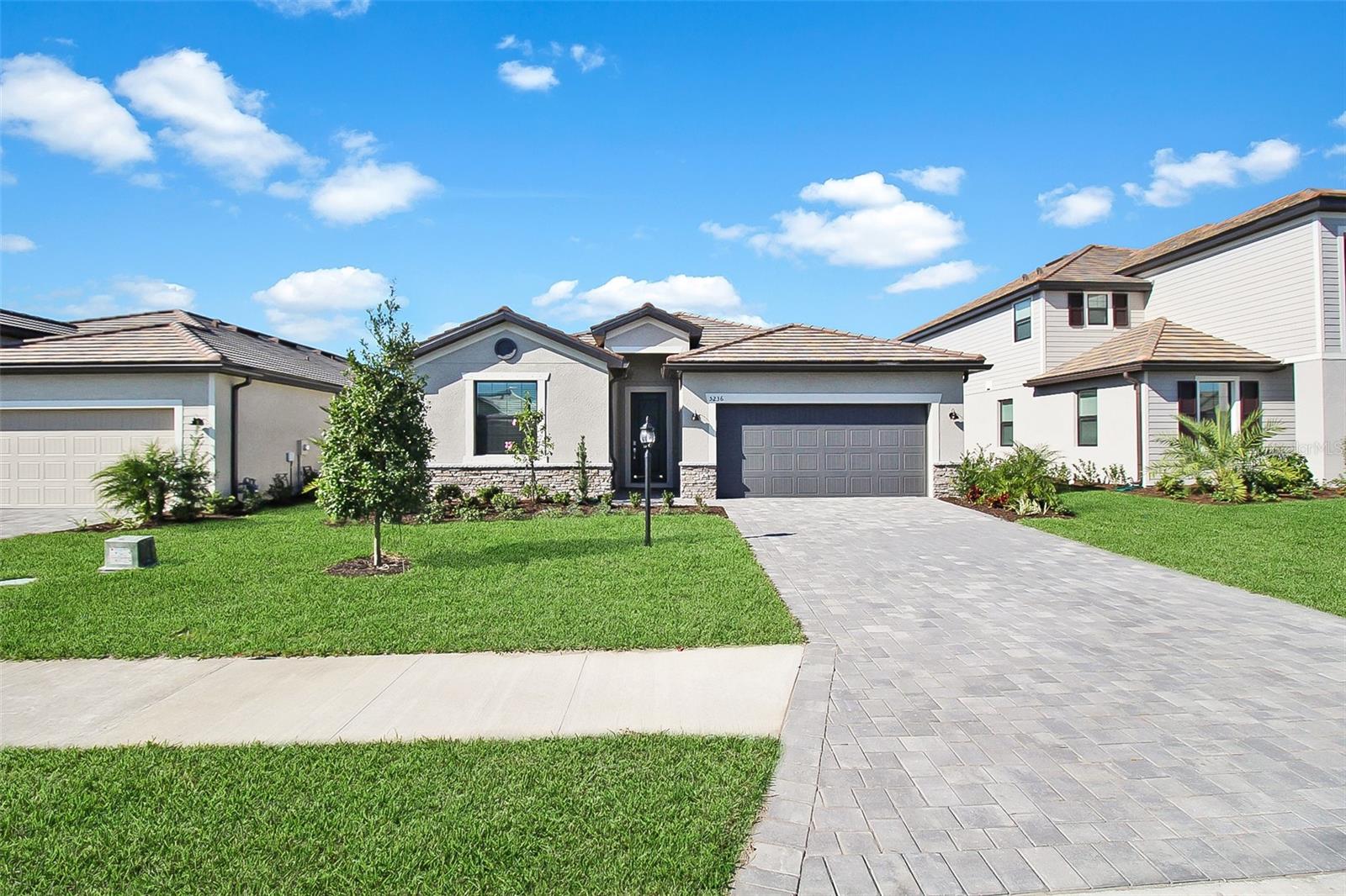Waterfront Dreamin is the epitome of luxury living at this magnificent 4-bedroom, 3-bathroom private pool home, nestled in the prestigious community of Lorraine Lakes, Florida. Situated on an enviable lot, this homes offers breathtaking panoramic views of the serene lake, providing a tranquil backdrop to your everyday life.
As you enter, you are greeted by a grand foyer that sets the tone for the elegance that unfolds throughout the home. The expansive living spaces feature high ceilings, windows, and exquisite finishes, creating an ambiance of opulence and sophistication.
The heart of the home is undoubtedly the outdoor space. Large sliding glass doors beckon you to the outdoor oasis, where a private pool awaits. Immerse yourself in the refreshing waters or lounge on the poolside patio as you soak in the sun and relish the picturesque lake views. There is also outdoor seating for you to gather with family and friends.
The open-concept design seamlessly connects the kitchen to the spacious living and dining areas, making it an ideal space for entertaining guests or simply enjoying quality time with family. The living room has a large sectional with a Smart TV. The gourmet kitchen is adorned with top-of-the-line appliances, custom cabinetry, and a center island that doubles as a stylish breakfast bar. This culinary haven is a dream for both aspiring chefs and those who appreciate the finer things in life.
The primary bedrooms is a sanctuary of indulgence, featuring a generously sized bedroom, a spa-like en-suite bathroom with a dual vanity, and a walk-in shower. The second bedroom offers plenty of space to unwind after a day of adventuring, and is adjacent to the second bathroom. The second bathroom has an updated with a shower/tub combo. The third bedroom is perfect for the kids! There is a bunk bed with plenty of space for toys. The fourth bedroom has chic decor, and plenty of closet space. Attached is the third bathroom that has an updated vanity, with a shower/tub combo.
Nestled within the sought-after Lorraine Lakes community, this home perfectly balances serenity with convenience. There is a Clubhouse with a state-of-the-art fitness center, aerobics studio, splash park, a large resort style community pool, a playground, a sports court, a basketball court, tennis courts, volleyball courts and much more. Enjoy the tranquility of this picturesque neighborhood while being just moments away from the vibrant amenities of Lakewood Ranch. Explore the diverse dining options, upscale shopping, and recreational opportunities this charming area offers.
House Rule: No smoking. No burning candles inside of lodging. No parties.
Dogs welcome, max 2, and require a $200 per pet non-refundable pet fee to be paid directly to the management company.
Pool heating is optional, for an additional non-refundable fee of $25 per day + taxes to be paid directly to the management company after the reservation is confirmed.
**Taxes and fees not included.