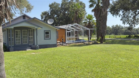 Photo of 14740 Johns Road, Dade City, FL 33525 (MLS # O6432438)