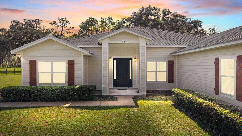 Photo of 324 NE 300th Street, Cross City, FL 32628 (MLS # W7888812)