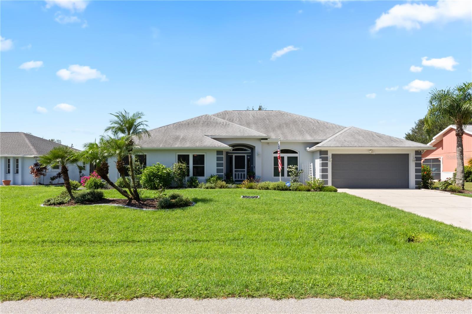 Welcome to this SPACIOUS 4 Bedroom, 3 Bathroom, 2-Car Garage home offering 3,049 sq. ft. of living space on an OVERSIZED LOT in the highly sought-after Deep Creek community. 1 YEAR TRANSFERRABLE HOME WARRANTY BEGINNING 10/4/25!CLICK ON THE VIRTUAL TOUR LINK 1 FOR THE VIDEO AND VIRTUAL LINK 2 FOR THE 3D TOUR. Step inside to find tile flooring throughout the main living areas, soaring vaulted ceilings, and abundant natural light that create an open and inviting atmosphere. The expansive living and dining room combination is ideal for gatherings, while the eat-in kitchen features a center island, breakfast bar, walk-in pantry, ample counter space, and plentiful cabinetry for all your storage needs. The primary suite is generously sized, complete with dual walk-in closets and a private bath boasting a dual sink vanity, walk-in shower, and a jetted jacuzzi tub. The guest bedrooms are equally impressive, with two offering walk-in closets and one with a built-in for added convenience. Enjoy year-round outdoor living on the large screened-in back lanai, perfect for entertaining or relaxing in the Florida sunshine. This home also provides peace of mind with full hurricane protection, including impact windows, manual shutters, a buried 500-gallon propane tank, and a whole-home generator. 2022 HURRICANE WINDOWS - 2021 WHOLE HOME GENERATOR - 2022 DUAL OVEN, DUAL FRIDGE & BOSCH DISHWASHER - 2023 GUEST BEDROOM FLOORING - 2023 GUEST BATHROOM REMODEL - 2023 EXTERIOR PAINTED - ADT SECURITY SYSTEM (monthly subscription required). Deep Creek is a deed-restricted neighborhood with amenities including Deep Creek Social Club, Deep Creek Park, featuring a playground, tennis courts, basketball courts, and Deep Creek Golf Course, just a couple of miles down the road —perfect for staying active or spending time outdoors. Easy access to local favorites such as Fishermen's Village, Ponce De Leon Park, shopping & boutiques, fine & casual dining, LIVE entertainment, and a short drive to local beaches. Schedule your showing TODAY!