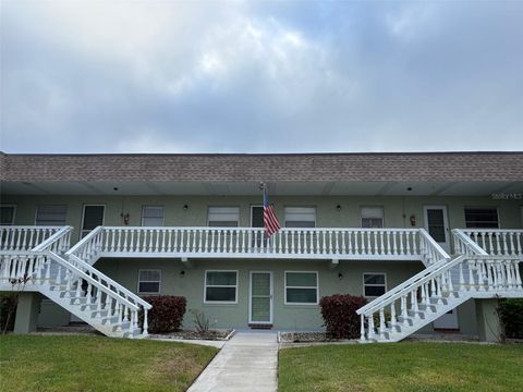 Photo of 1250 S Pinellas Avenue #411, Tarpon Springs, FL 34689 (MLS # TB8439342)