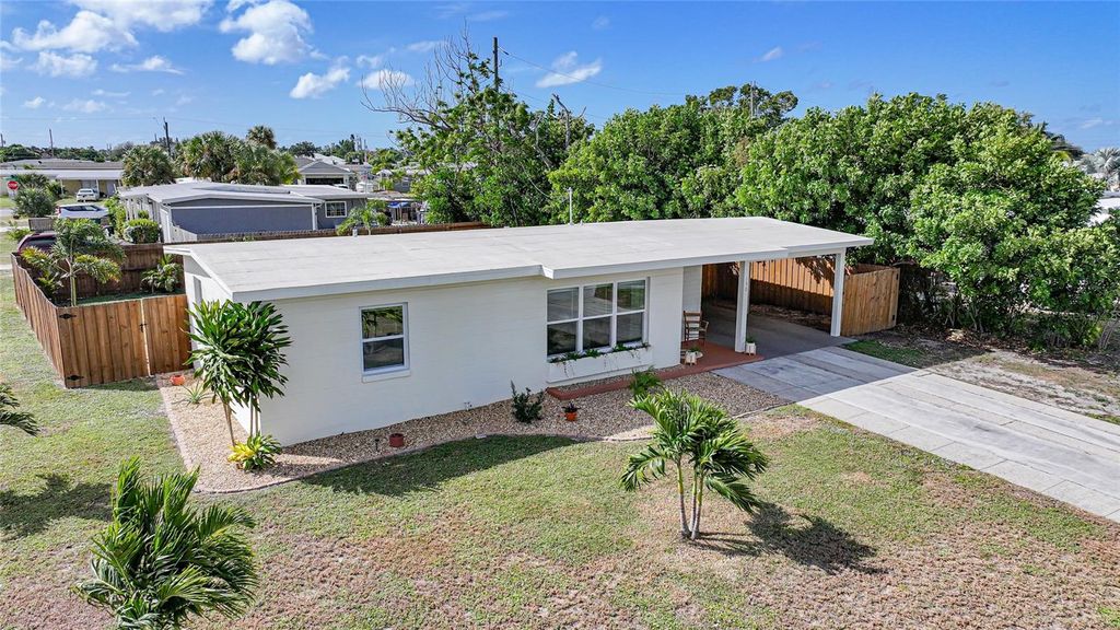 Photo of 130 Palmetto Circle NE, Port Charlotte, FL 33952 (MLS # C7516872)