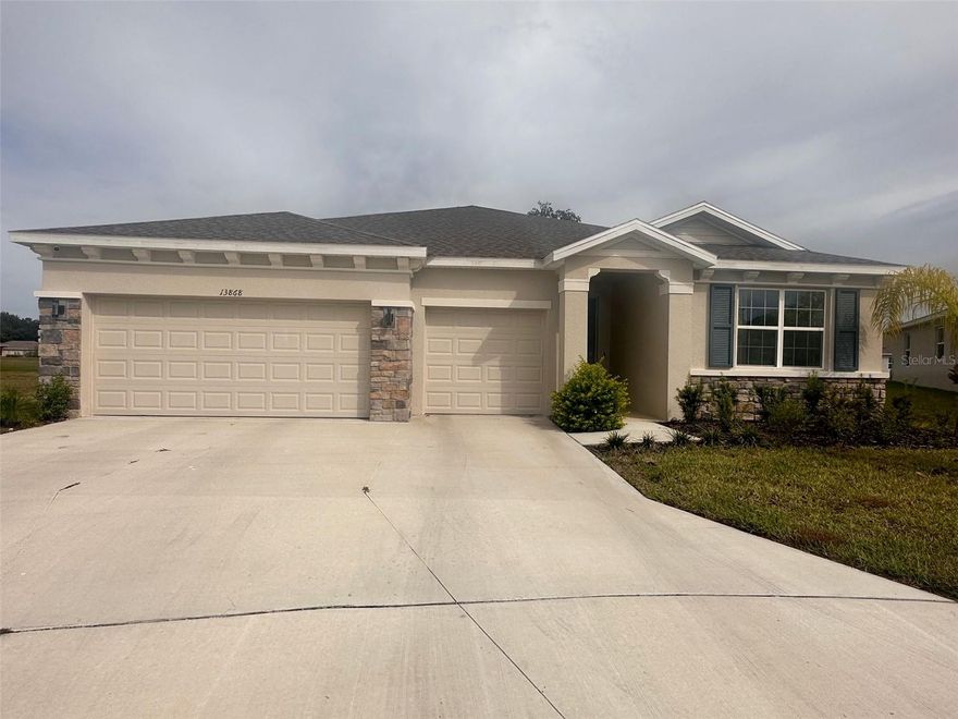 Come and experience this four bedroom, three bath, three car garage cul-de-sac pond view home in Dade City Heritage Hills. There are two separate living spaces making this convenient for multi family purpose. Open living room, kitchen concept, flowing into the dining room and gorgeous modern upgrades. Two bedrooms have Jack and Jill bath while the fourth bedroom has its own living room and bathroom all close to the oversize laundry area. There is also a mudroom to slough off the shoes of the day. The kitchen has all white cabinets with gorgeous granite, countertops, stainless steel appliances, and separate breakfast nook. This leads into the master bedroom with plenty of space for a king suite and overlooks the pond. The master bathroom has separate shower  stall, large soaking tub, custom, built, closet, and separate lavatory. Come and enjoy the back screened in lanai and privacy of no backyard close neighbors.