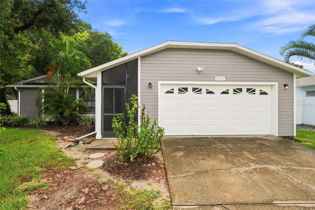 Photo of 2475 Gulfbreeze Circle, Palm Harbor, FL 34683 (MLS # W7888304)