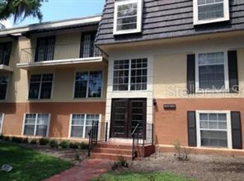 Photo of 3975 Versailles Drive #3975F, Orlando, FL 32808 (MLS # O6402415)