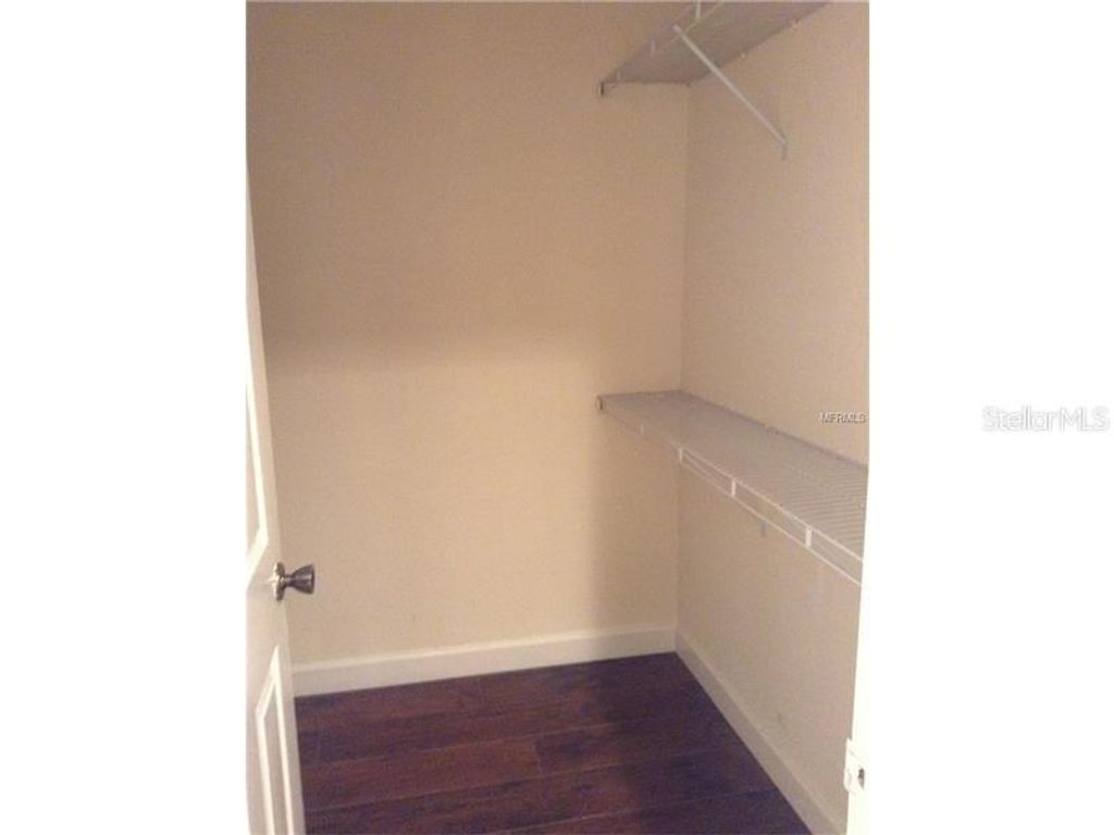 Photo of 3975 Versailles Drive #3975F, Orlando, FL 32808 (MLS # O6402415)