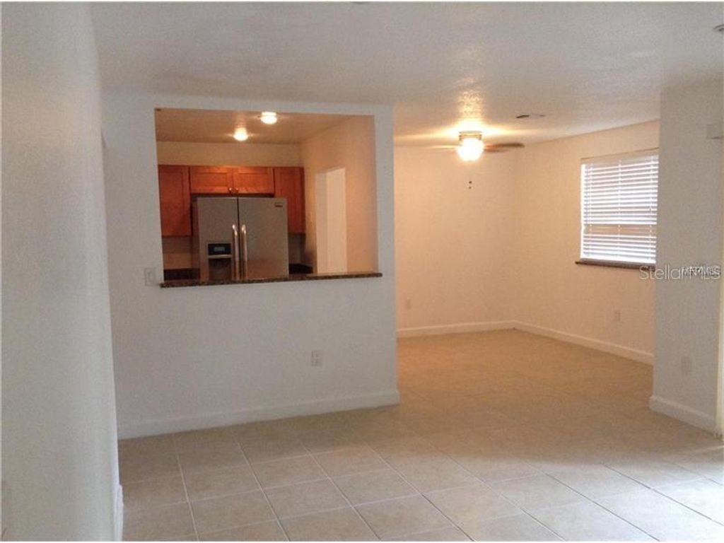 Photo of 3975 Versailles Drive #3975F, Orlando, FL 32808 (MLS # O6402415)