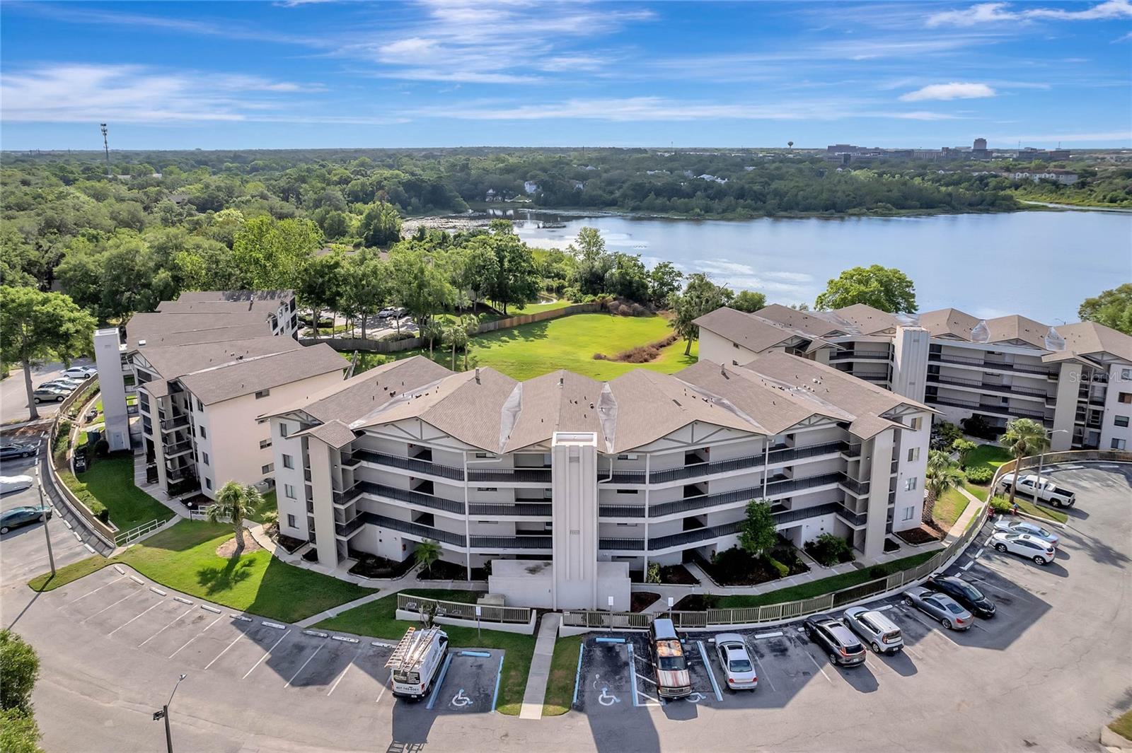 AMAZING LAKEVIEW CONDO!! This beautifully REMODELED condo is located on the TOP FLOOR of the building providing SPECTACULAR LAKE VIEWS with no upstairs neighbors. These amazing views can be seen from the PORCH and the primary bedroom. This unit has two bedrooms and two UPDATED BATHROOMS within 1,001sf of living space. Ride the ELEVATOR up to the 4th floor and notice you are steps away from your home. The front door is located just a few steps from the elevator. Upon entering the condo, you will notice all the NATURAL LIGHT coming in from both sides of the unit. The UPDATED and MODERN KITCHEN, complete with BRAND NEW APPLIANCES (fridge, range, dishwasher, microwave and garbage disposal) is sure to impress. Move through the condo to the living room with attached porch, giving you the most amazing view of LAKE LOTUS. Also benefiting from the view is the LARGE PRIMARY BEDROOM, complete with NEW FLOORING, PAINT, and HARDWARE. Imagine waking up and enjoying your fresh cup of coffee while overlooking the lake. The primary bedroom has its own ENSUITE BATHROOM updated with NEW VANITY and MODERN FIXTURES. The second bedroom also boasts NEW FLOORING, PAINT, and HARDWARE, and would make the perfect guest room or office for anyone who works from home. FRESH PAINT throughout gives you the clean and consistent look to customize with your own décor, and the NEW CEILING FANS installed keep with that modern look. Rest easy knowing that all the MAJOR COMPONENTS were REPLACED in 2018 including the ROOF, NEW HVAC and NEW WATER HEATER! The unit was also RE-PLUMBED in 2022. Home comes equipped with SMART THERMOSTAT and SMART DOORBELL.
This lakefront community is located in the “A” rated Lake Brantley High School district!
The community also comes with a ton of amenities including the POOL, CABANA, WALKING & BIKING TRAILS, TENNIS COURTS and SAND VOLLEYBALL! Lake Lotus is a spring fed lake that allows for KAYAKING and FISHING. The community is located just minutes from I-4, the 414, 429, Altamonte Mall with tons of amazing shops and restaurants. Schedule your showing today!