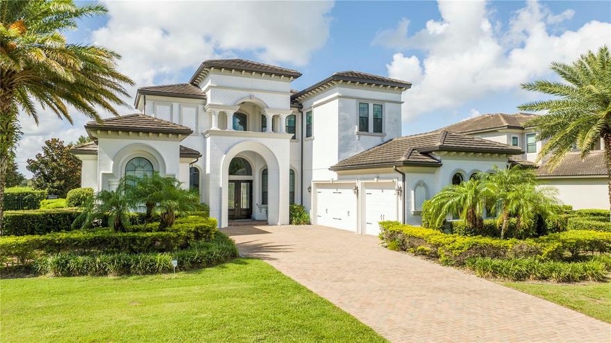 Welcome to 4279 Isabella Cir, Windermere, FL 34786. This 5-bedroom, 4/2-bathroom home has been completely remodeled and upgraded, perfectly marrying luxury with comfort. As you enter, you are greeted by an impressive formal living room with 30’ ceilings and two stories of windows that offer a stunning view of the sparkling swimming pool. Within the foyer, you will find the office to your left and a formal dining room to your right. The left wing of the home is dedicated entirely to the private master suite, featuring tray ceilings, two walk-in closets, a separate sitting area, dual vanities, a soaking tub, and a large wrap-around walk-in shower. Across the home, an open kitchen and family room await, complete with an oversized island, brand new cabinets, Calacatta Quartz countertops, top-of-the-line appliances, and a breakfast nook. Step through the stacking sliding glass doors onto the extended covered lanai, where it becomes clear that this home was designed to embrace Florida living. The lanai features a summer kitchen and ample space for an outdoor dining area. The resort-style swimming pool includes a heated spa, stone paver patio, sun deck, and an elegant water feature. The tropical landscaping creates a vacation-like ambiance as you lounge poolside. Additional features of this home include a first-floor guest suite, three second-floor bedrooms, a media room, and a 3-car garage. Conveniently located in Casabella, an upscale gated community in Windermere, this home is close to Windermere High School, Winter Garden Village, and major highways. THIS IS A MUST-SEE!