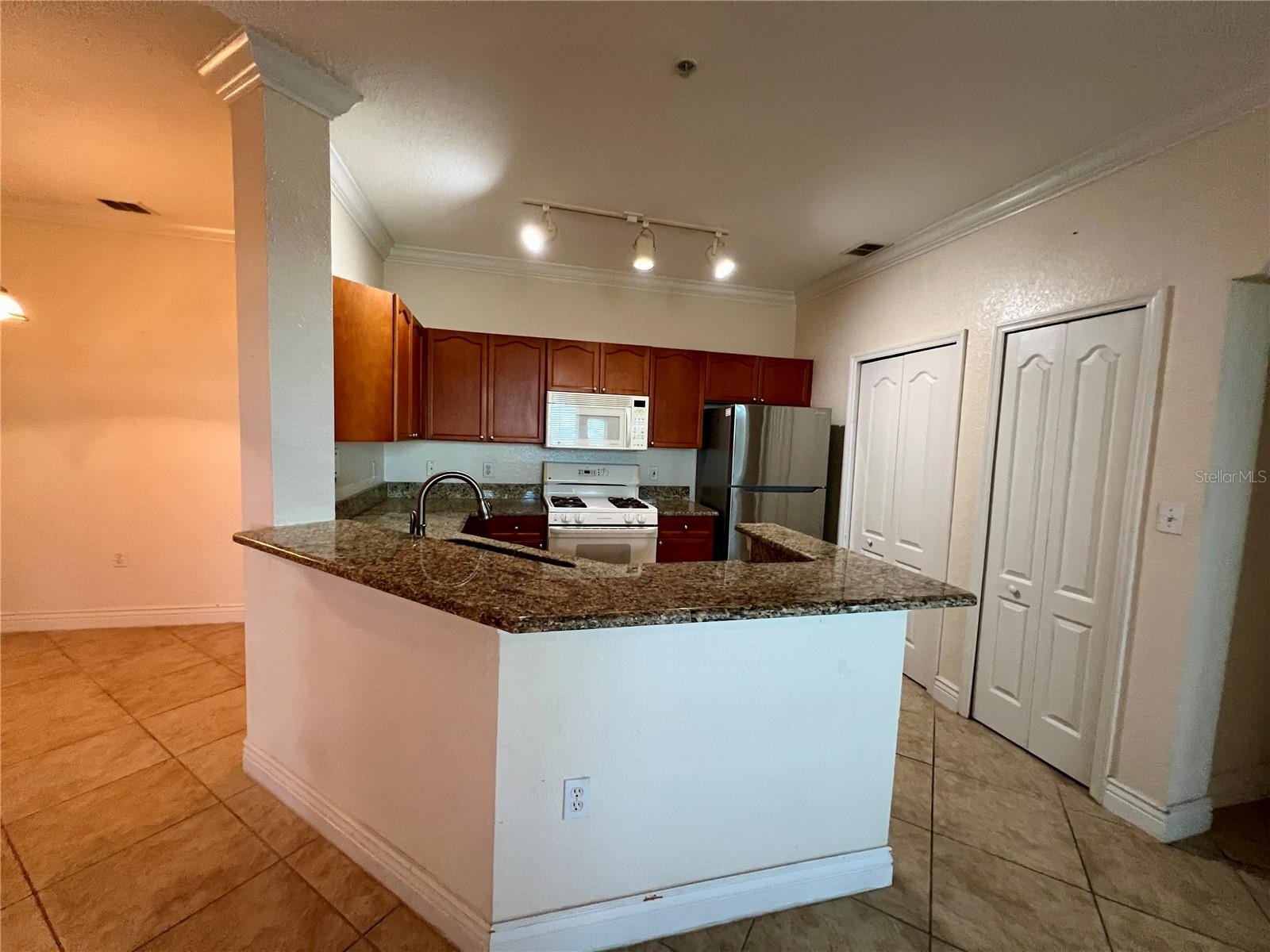 GRAND BELLAGIO AT BAYWATCH CONDO THE - Residential Lease