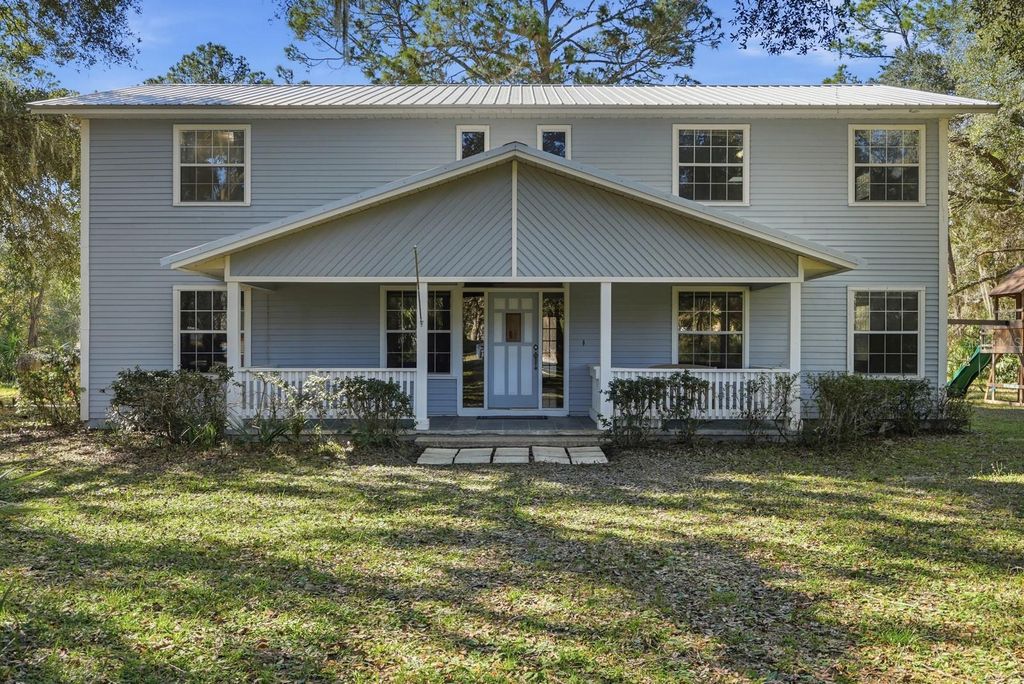 Photo of 404 Old Haw Creek Road, Bunnell, FL 32110 (MLS # FC315604)