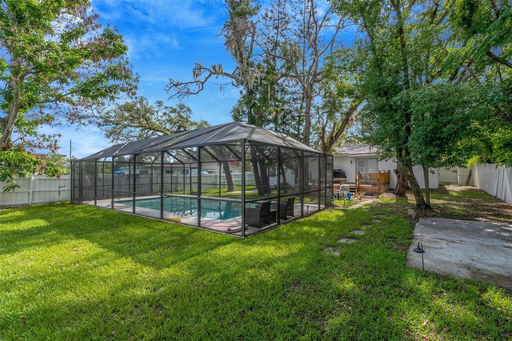 Photo of 8732 Overlook Drive, Tampa, FL 33617 (MLS # O6413812)