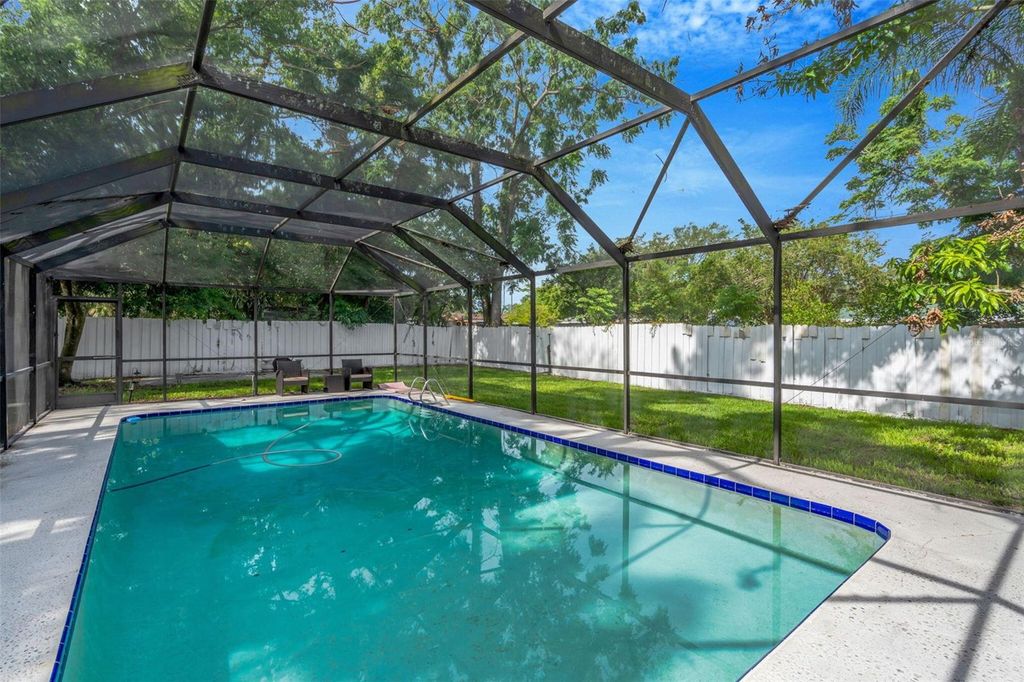 Photo of 8732 Overlook Drive, Tampa, FL 33617 (MLS # O6413812)
