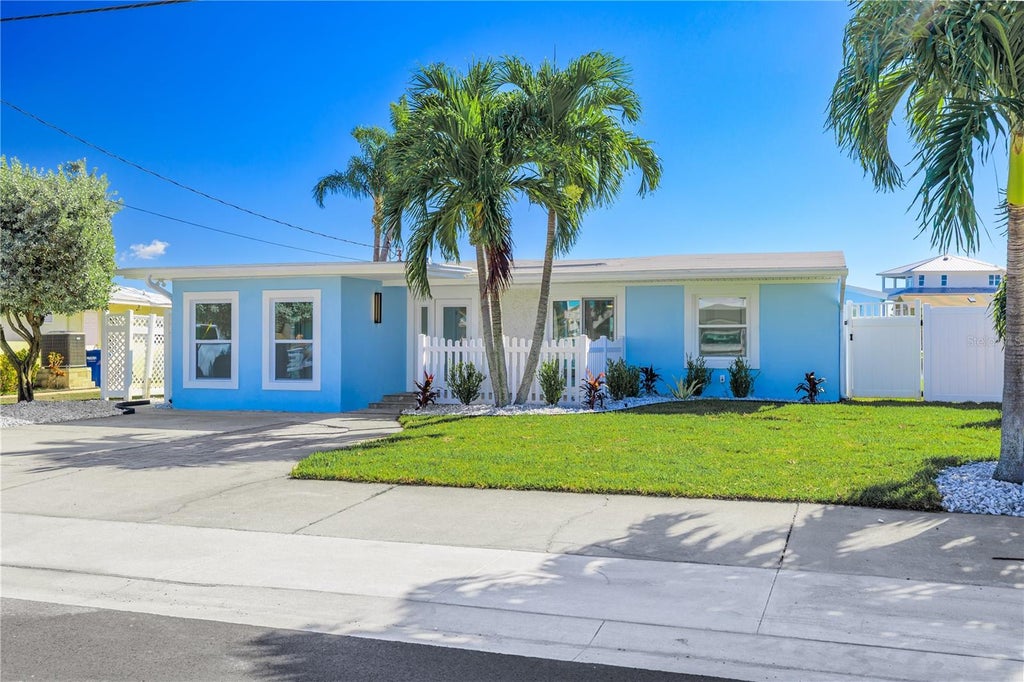 Photo of 730 Pruitt Drive, Madeira Beach, FL 33708 (MLS # TB8558873)