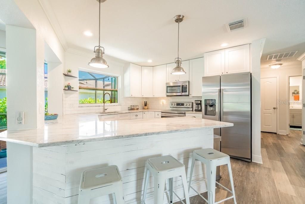 Photo of 1219 Village Green Parkway, Bradenton, FL 34209 (MLS # A4689537)