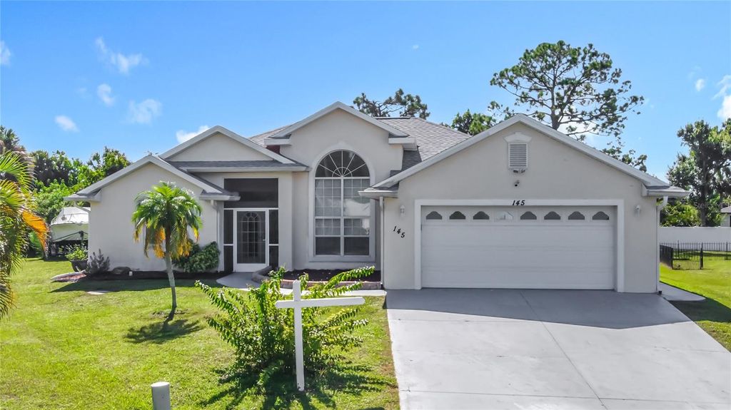 Photo of 145 Spur Drive, Rotonda West, FL 33947 (MLS # D6140886)